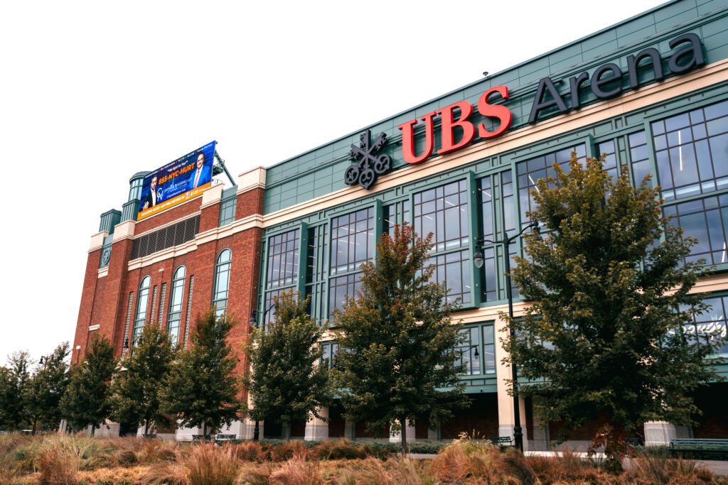 UBS Arena with a Chopra & Nocerino advertisement banner