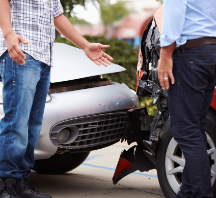 Two men talking about their car accident.